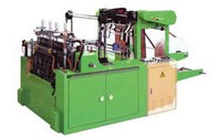 Electronic and automatic high speed sealing and cutting T shirt bags machine